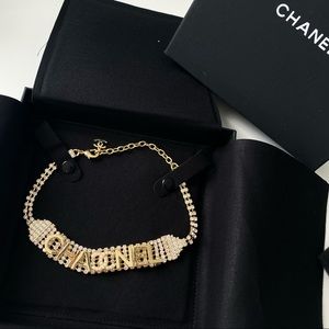 Gold tone pearl & crystal chocker